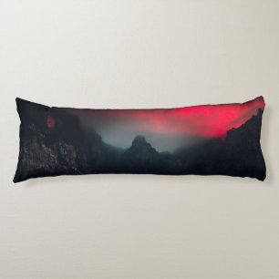 Burning clouds, fog and mountains body cushion