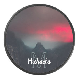 Burning clouds, fog and mountains monogram hockey puck