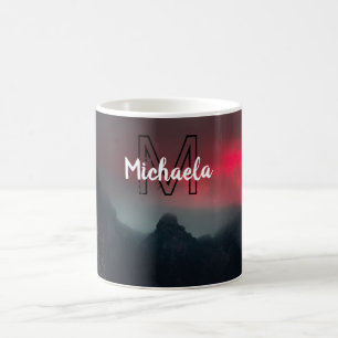 Burning clouds, fog and mountains monogram in sky coffee mug
