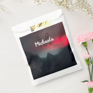 Burning clouds, fog and mountains monogram in sky favour bags