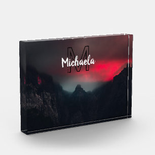 Burning clouds, fog and mountains monogram in sky photo block
