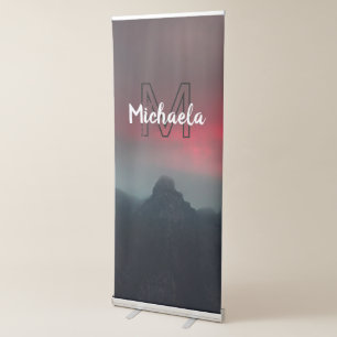 Burning clouds, fog and mountains monogram in sky retractable banner