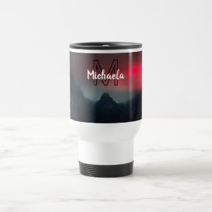 Burning clouds, fog and mountains monogram in sky travel mug