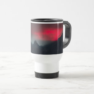 Burning clouds, fog and mountains travel mug