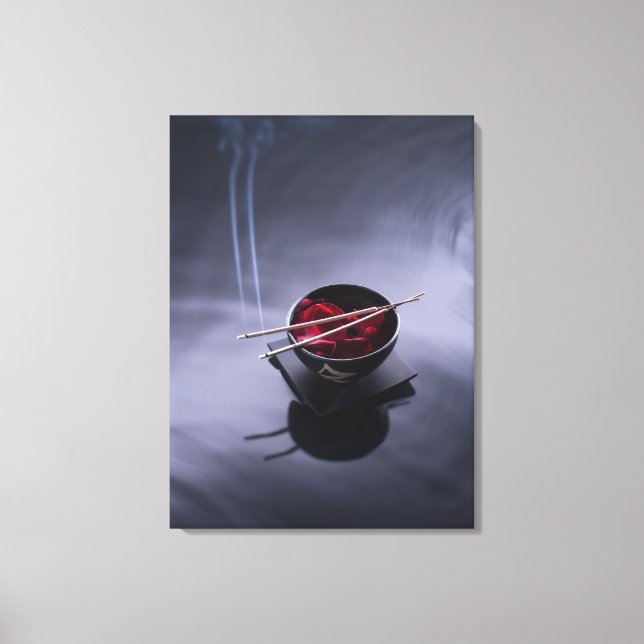 Burning incense on top of bowl of petals canvas print (Front)