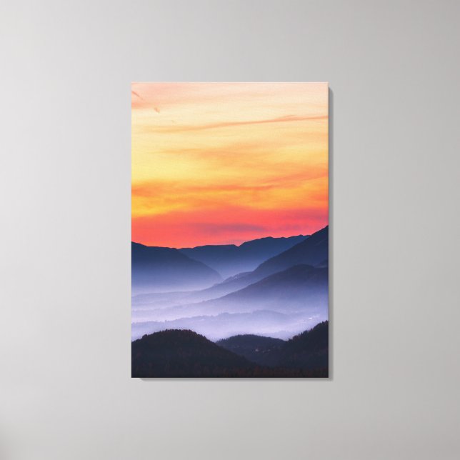 Burning sunset and fog in valley canvas print (Front)