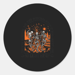 Burning the witches halloween skeleton dancing classic round sticker