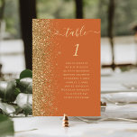 Burnt Orange Gold Glitter Wedding Table Number<br><div class="desc">The left-hand edge of this elegant modern wedding table number card features a gold faux glitter border. The word "table" appears in gold-coloured whimsical handwriting script on a black background. Add the names of your guests who are assigned to each table.</div>