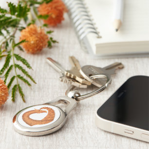 Burnt orange heart dragon on white key ring