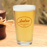 Burnt Orange Stylised Wedding Groomsman Name Glass<br><div class="desc">Beer glass for the wedding groomsman that features his name printed in a trendy, burnt orange colour, stylised script inside a burnt orange colour oval border along with wedding date. A great party supply idea for a bachelor party! Personalise your beer glass by editing and replacing name and date with...</div>
