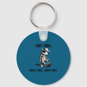 Bury things maybe plants maybe peole frog gardener key ring