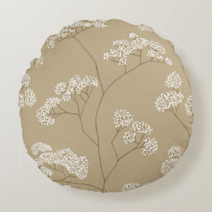 Bushes of small white flowers in beige color palet round cushion