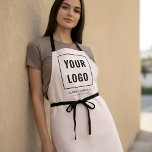Business Logo Branding Blush Pink Apron<br><div class="desc">Discover the epitome of personalised professionalism with our custom aprons, tailored exclusively to encapsulate the essence of your brand! Our superior-quality aprons are not just a protective overlay; they’re a statement of your brand’s unique identity. With your personalised business logo elegantly embroidered or printed on, these aprons serve as a...</div>