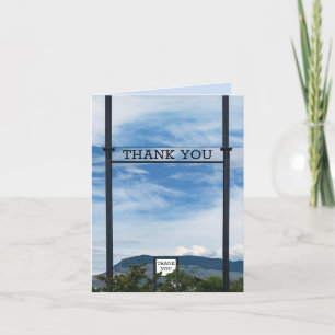 BUSINESS THANK YOU ON SIGN POST & BLUE SKY ABOVE