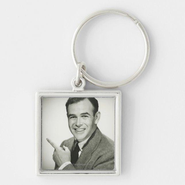 Businessman Pointing Key Ring (Front)