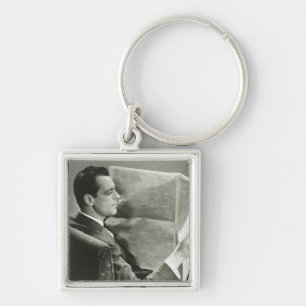 Businessman Reading the Newspaper Key Ring