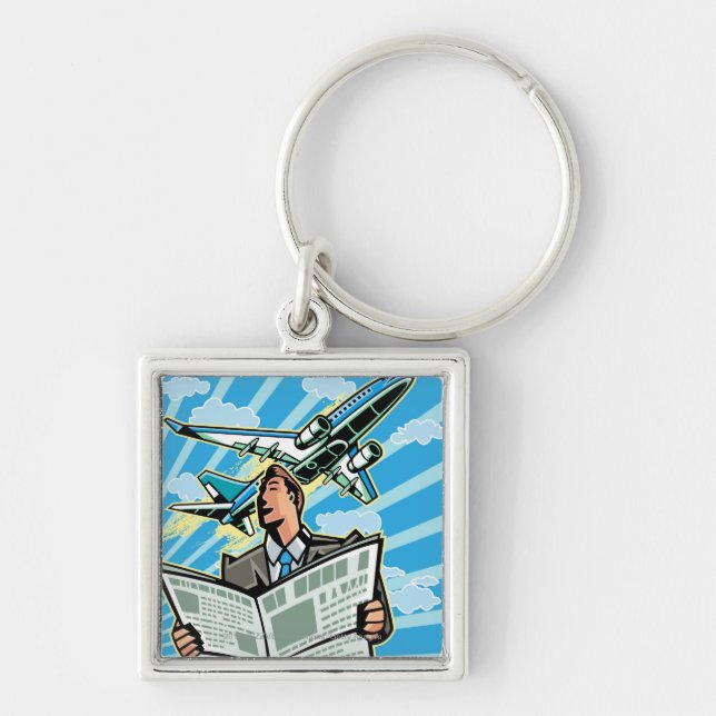 Businessman with newspaper and aeroplane above key ring (Front)
