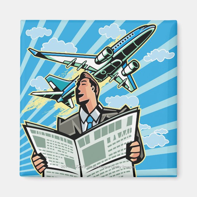 Businessman with newspaper and aeroplane above magnet (Front)