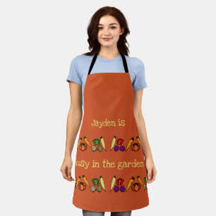 Busy in the garden, with vegetables, your name apron