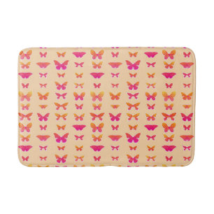 Butterflies, soft orange, coral pink, gold bath mat