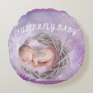 "Butterfly baby" round throw pillow in purple.