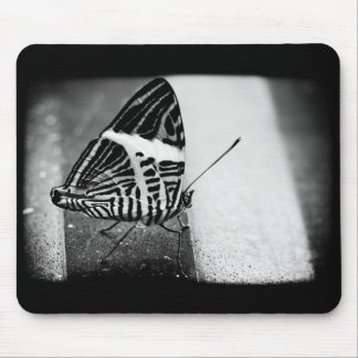 butterfly crossing mouse mat