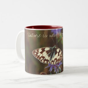 Butterfly on flower Two-Tone coffee mug