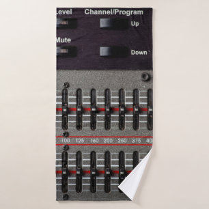Buttons on a sound mixer in a recording studio. bath towel