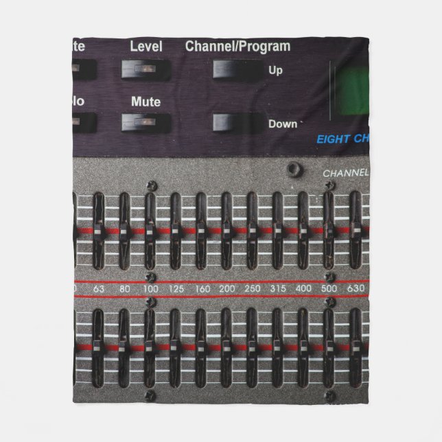 Buttons on a sound mixer in a recording studio. fleece blanket (Front)