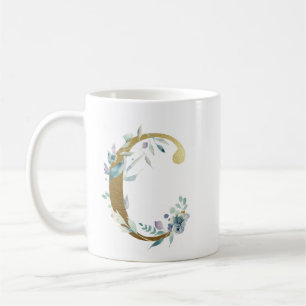 C gold initial with blue floral foliage coffee mug