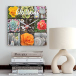 Cacti Roses Photo Collage Blossom Quote Script Square Wall Clock<br><div class="desc">Brilliantly red, yellow, and orange-hued roses and lush green, aqua, and black cacti shout warm, summer days. Enjoy the blossoms and the peaceful atmosphere of a vibrant garden whenever you check the time on this stunning, graphic photography wall clock. Makes a great housewarming gift! You can easily personalise this wall...</div>