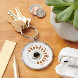 Caffeine loading key ring