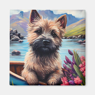 Cairn Terrier on a Paddle: A Scenic Adventure Magnet