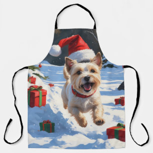 Cairn Terrier Running in Snow with Christmas Hat Apron