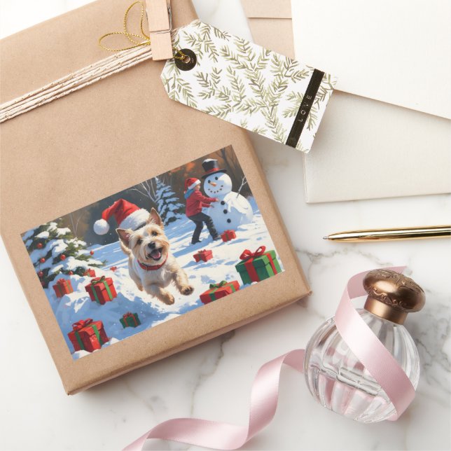 Cairn Terrier Running in Snow with Christmas Hat Rectangular Sticker (Gifting)