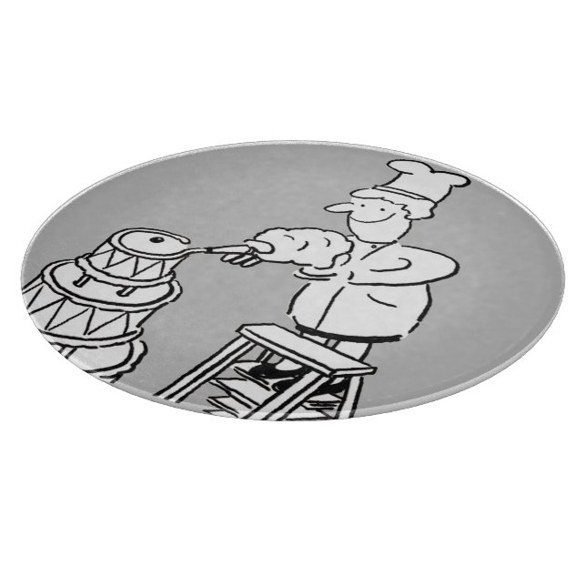 Cake Maker Decorating A Giant Sized Cake Cutting Board (Corner)