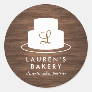 Cake Monogram Logo in White on Brown Woodgrain Classic Round Sticker