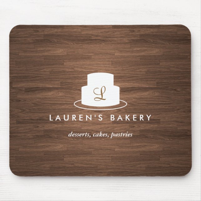 Cake Monogram Logo in White on Brown Woodgrain Mouse Mat (Front)
