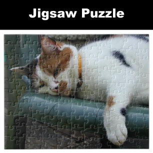 Calico cat sleeping jigsaw puzzle