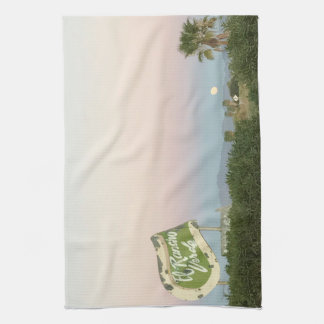 California desert sunset with the moon rising tea towel