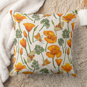 California poppies and moths on off white cushion