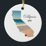 California Vacation Places Visited Ceramic Tree Decoration<br><div class="desc">Add a photo over the top of the map shape of the state of California. My sample photo was taken during a road trip to the aquarium and beach near Monterey Bay. You can change the heart color, move it, or delete that text symbol. Personalized text on back with information...</div>