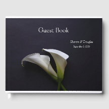 Calla lilies on a dark background
