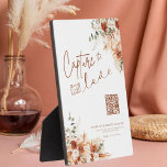 Calligraphy Script Capture The Love Wedding Boho Plaque<br><div class="desc">Add a touch of boho charm to your wedding with this Modern Bright Boho Script "Capture The Love" Wedding Tabletop Plaque with Easel. Designed with elegant terracotta flowers, this plaque combines style and function, making it a standout piece for your Wedding Tabletop Signs. Whether displayed on a table or incorporated...</div>