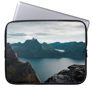 CALM BODY OF WATER NEAR MOUNTAIN LAPTOP SLEEVE