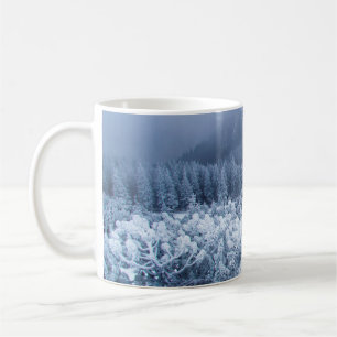 Calm foggy winter day on top of the mountains coffee mug