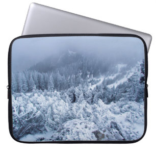 Calm foggy winter day on top of the mountains laptop sleeve