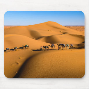 camels on desert under blue sky mouse mat