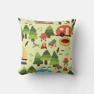 Camping scene - caravan, camping chairs, fire plac cushion