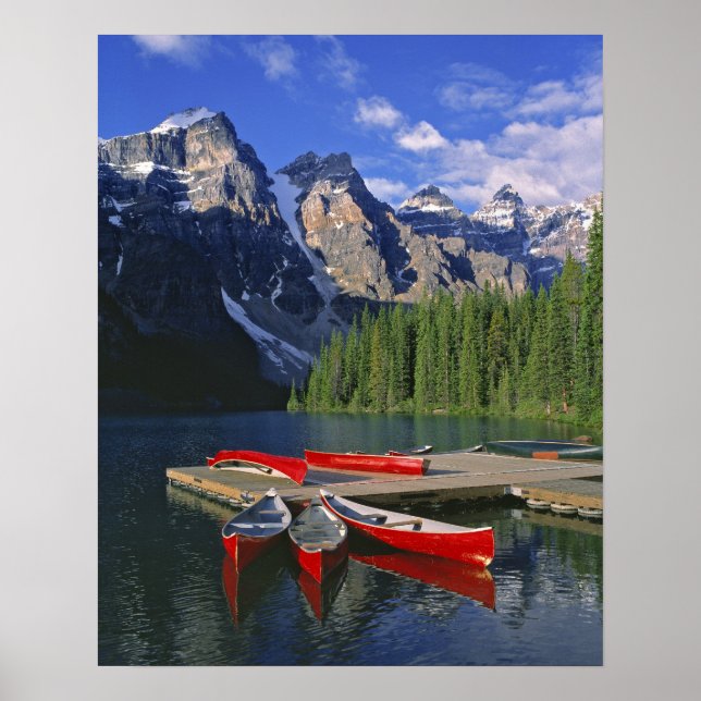 Canada, Alberta, Moraine Lake. Red canoes await Poster (Front)
